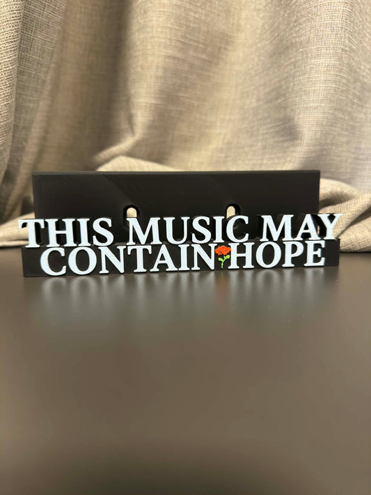 This Music May Contain Hope - Raye (Display Stand)